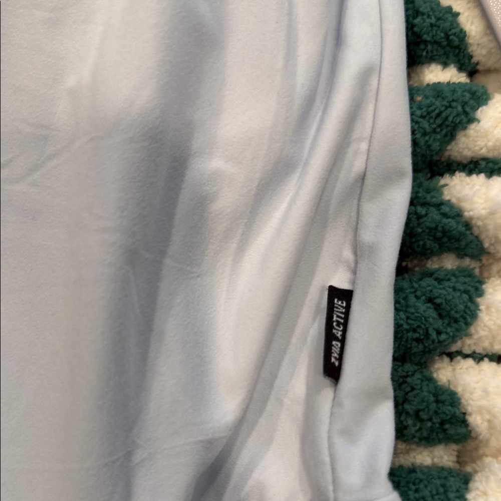 Set of Three Sleeveless Jumpsuits - Black, Light Blue, and Navy by Zyia. - Picture 7 of 9